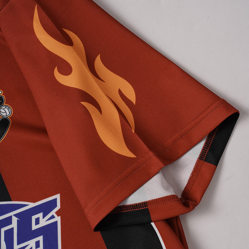 Rust red football jersey sleeve with orange flame graphics, black trim, and bold streetwear athletic styling