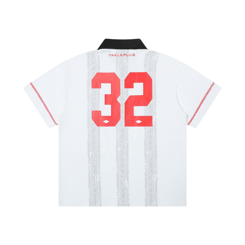 White retro soccer polo shirt with black collar, red number 32, and subtle tire-track stripe graphics on the back