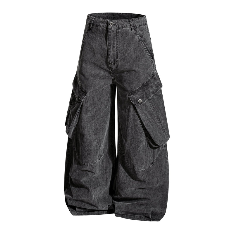 Three-quarter front view of washed black wide-leg cargo pants with flap cargo pockets