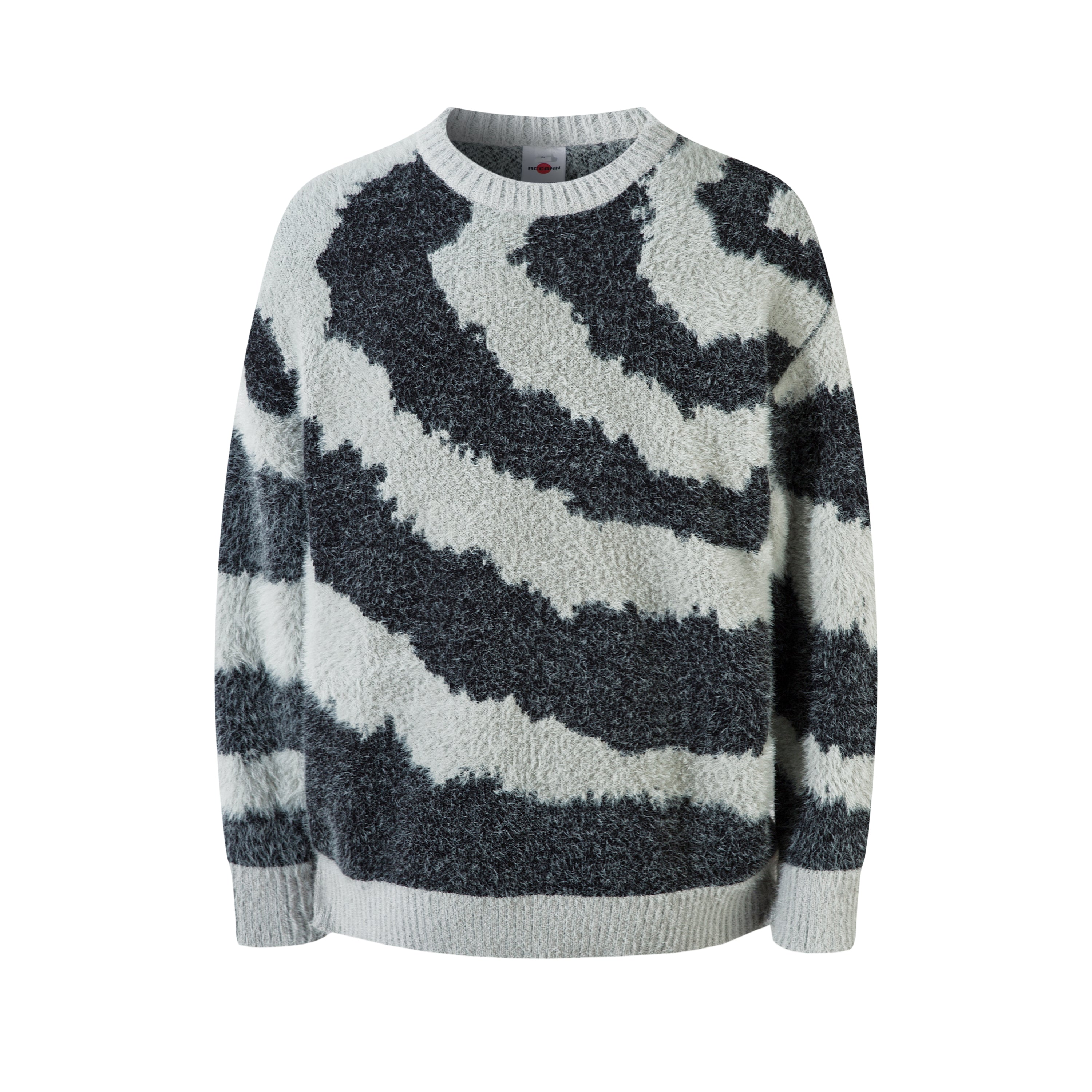 Front view of an oversized fluffy knit sweater with charcoal grey and off-white zebra stripe pattern and ribbed crew neck