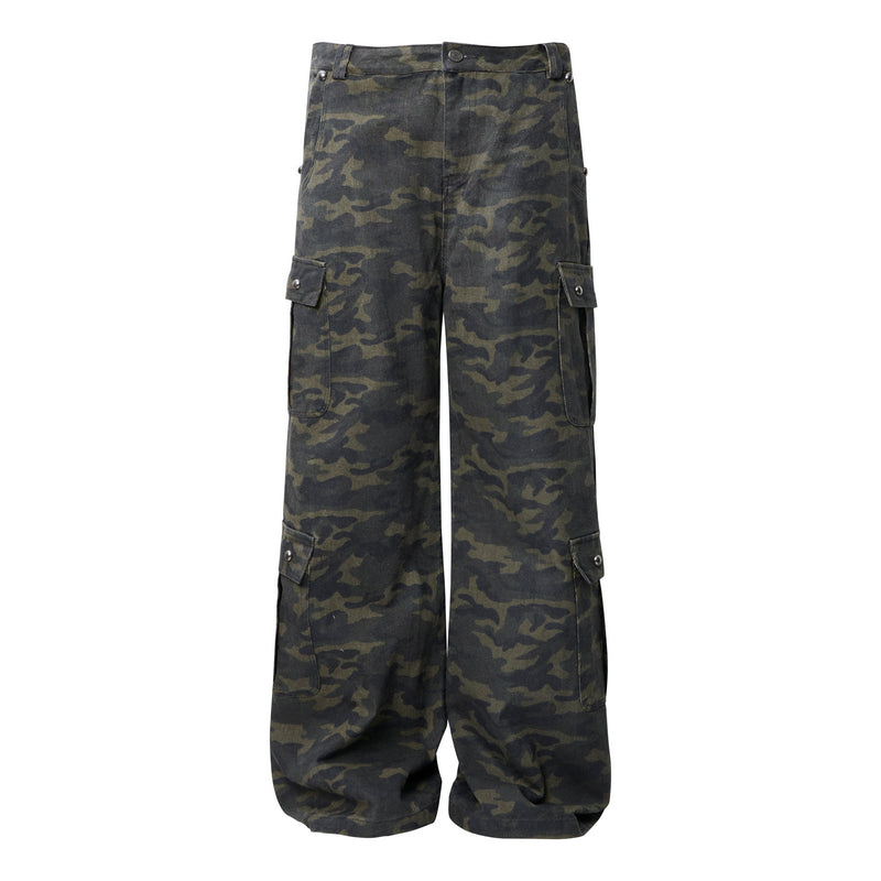Front view of camo wide-leg cargo pants with studded side pockets and a button waist