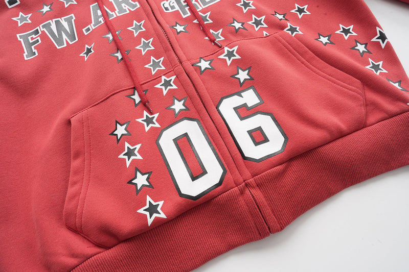 Front of red zip hoodie with star print, kangaroo pocket, and drawstrings