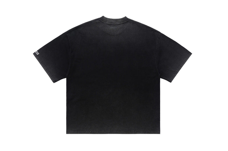 Black oversized streetwear tee with a minimalist back view, wide sleeves, and a clean crew neck silhouette