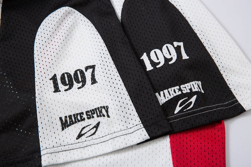 Black and white mesh polo shirt with 1997 and MAKE SPIKY graphics in a colorblock streetwear design