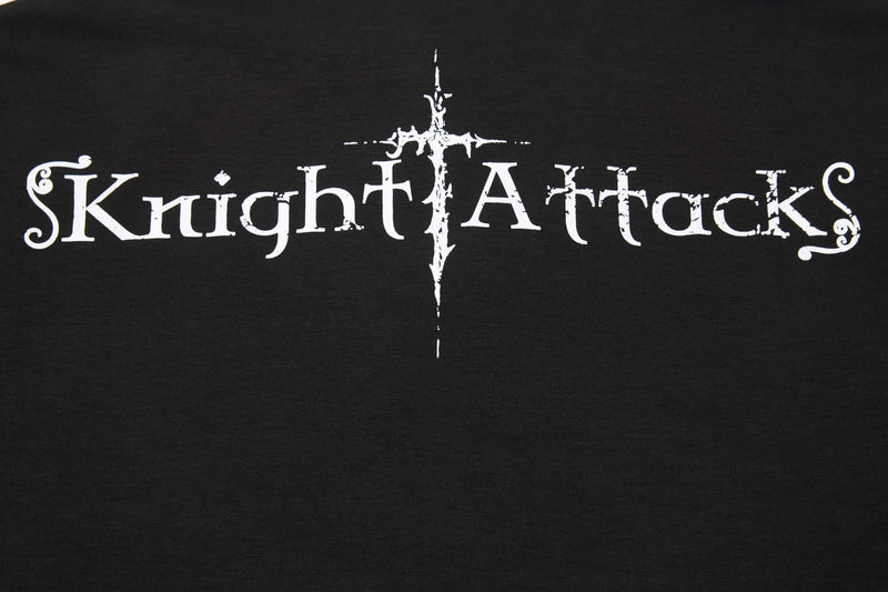 Black polo tee with distressed white Knight Attack gothic lettering and a medieval sword cross graphic centered on the chest