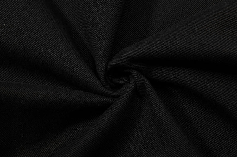 Close-up of black twill fabric texture with soft folds