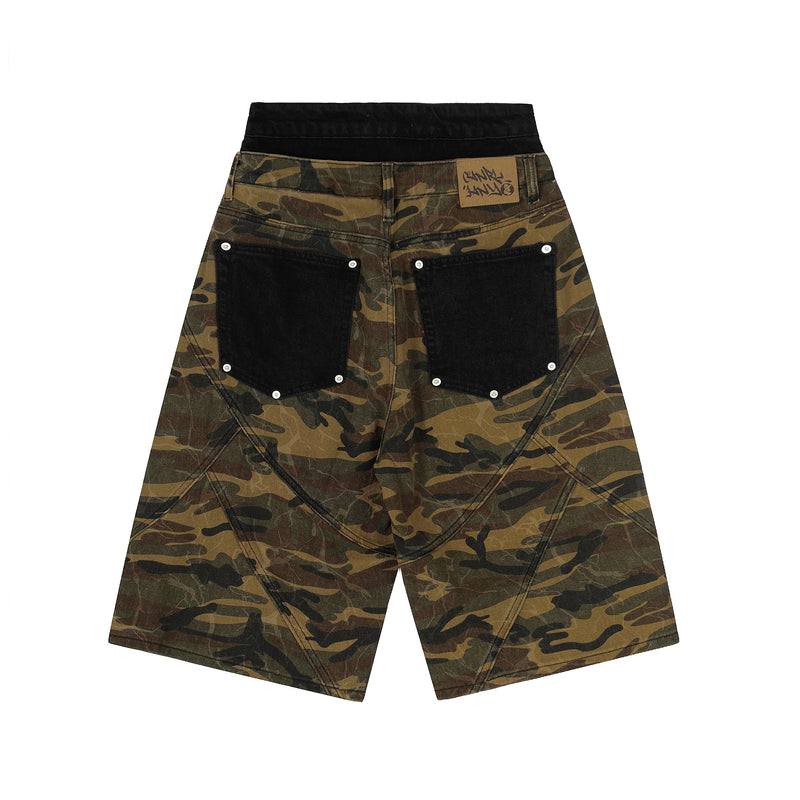 Back view of camo cargo shorts with black back panels and a tan logo patch