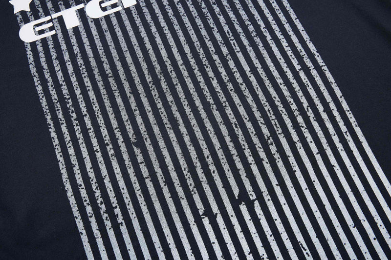 Black sport tee with white vertical stripe graphic and bold cropped lettering across the chest