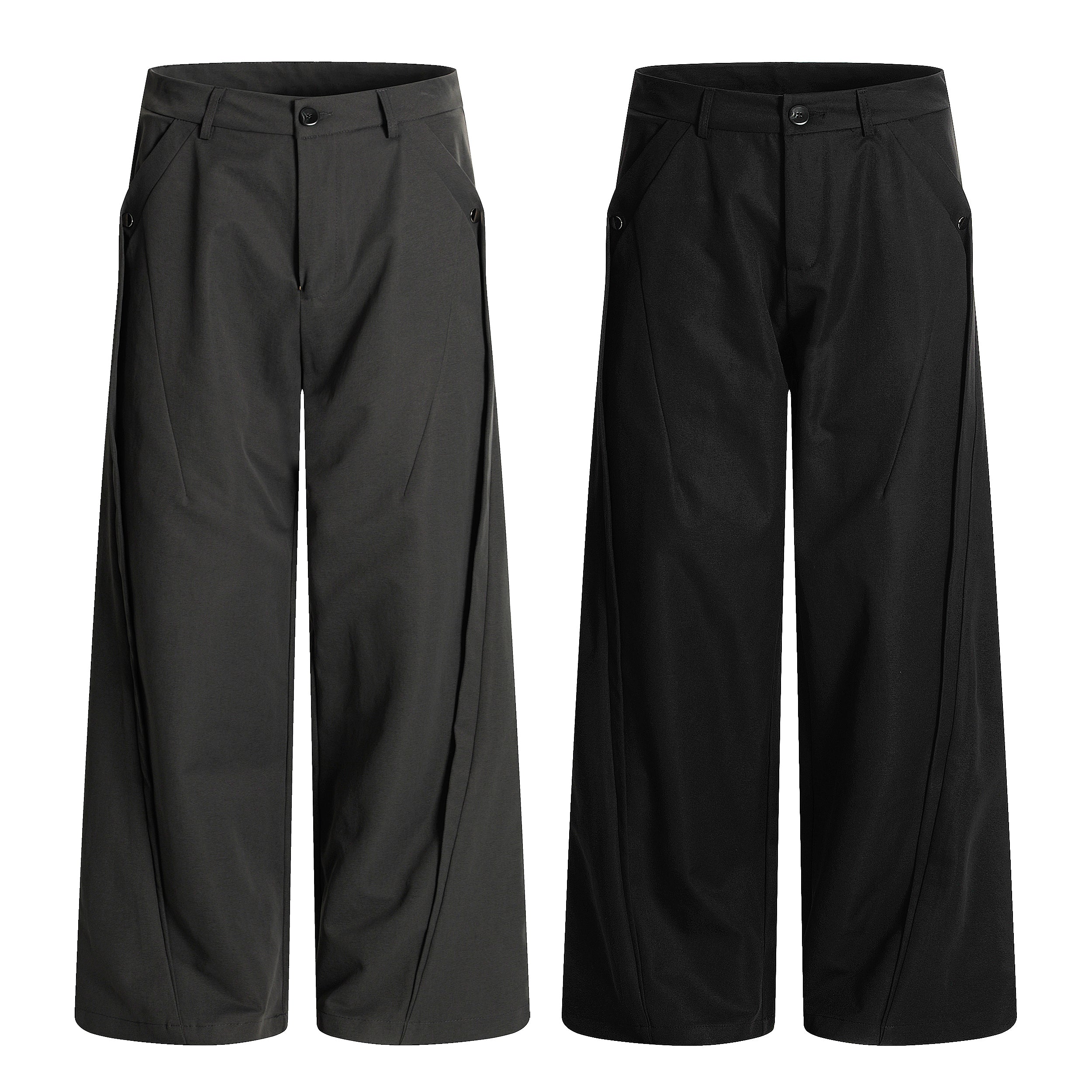 Omirad structured wide-leg trousers in dark charcoal and black, front view showing crease lines and angled button pockets