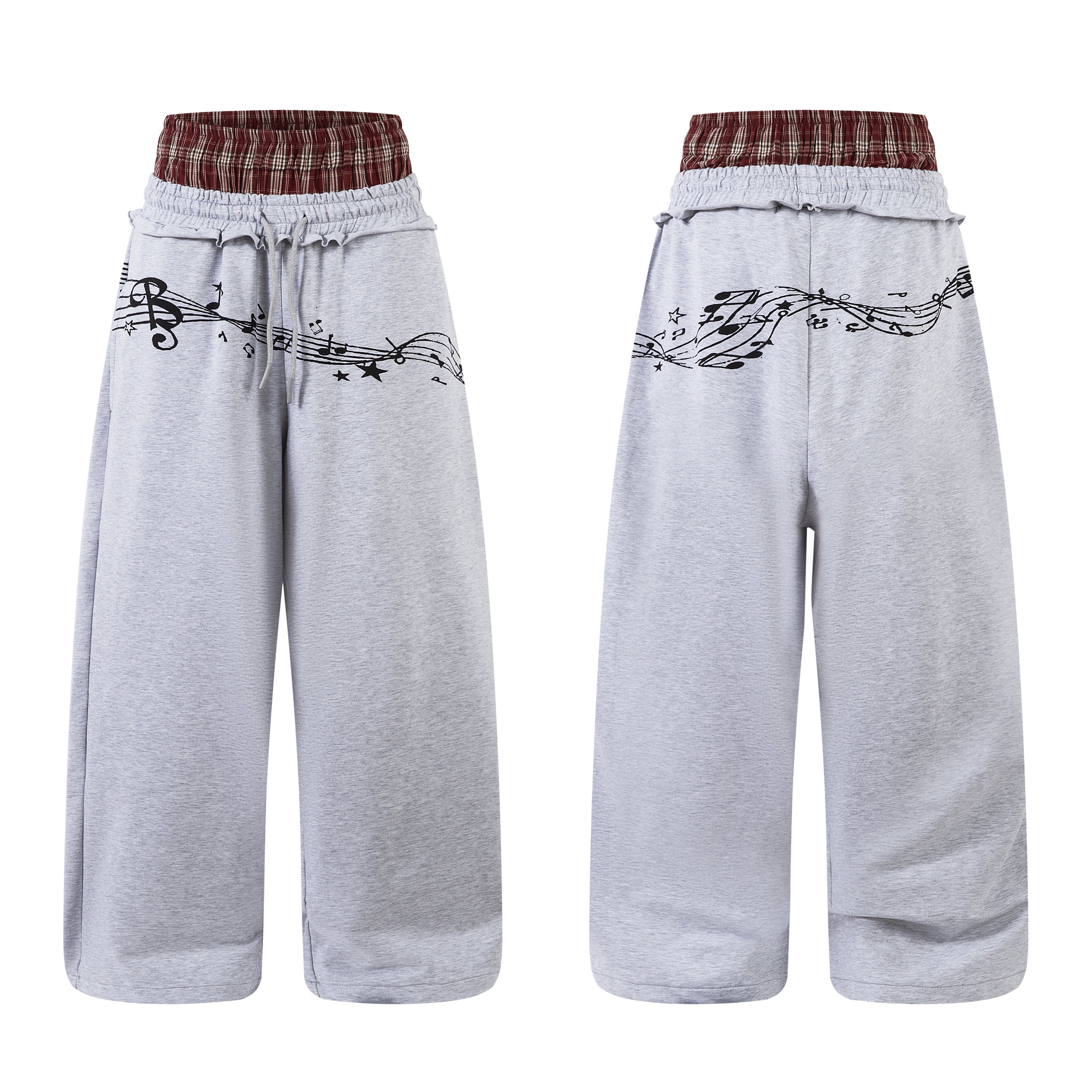 Front and back view of grey wide-leg sweatpants with music note graphic print and layered burgundy plaid waistband