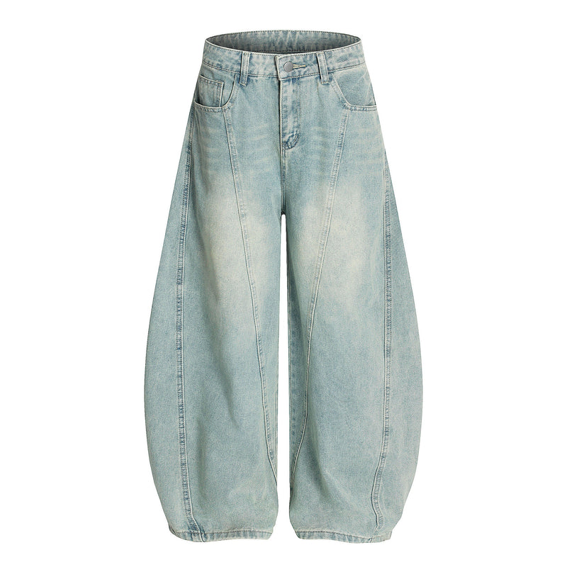 Light wash curved barrel jeans with wide legs, front view