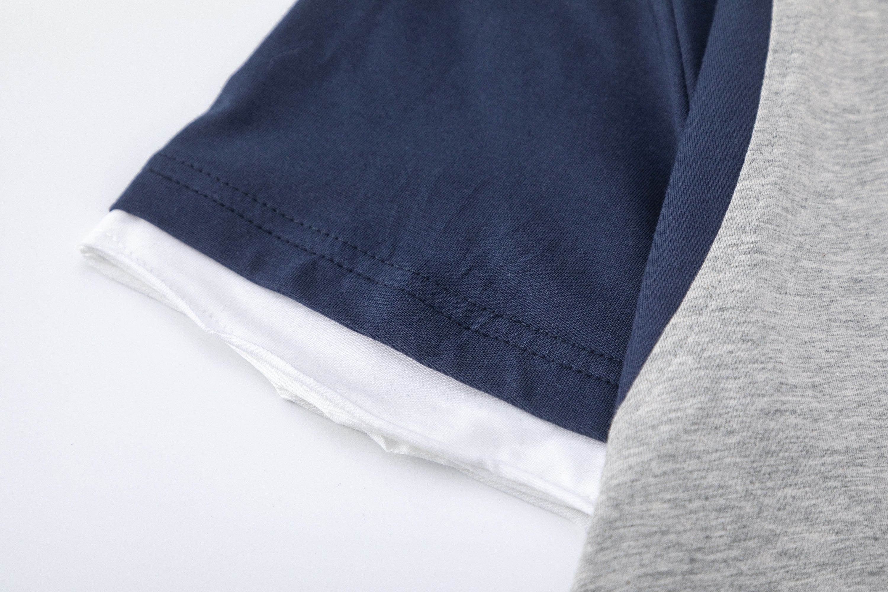 Colorblock Raglan T-Shirt | Contrast Sleeves & Layered Hem