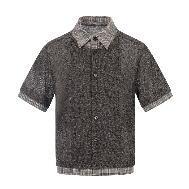 Short-sleeve layered knit shirt with plaid collar, cuffs, and hem in dark textured cotton on white background