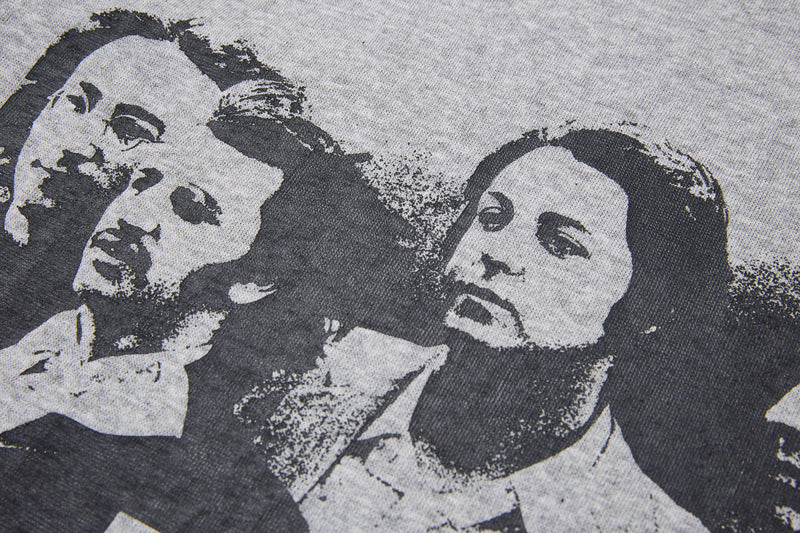 Black and white Beatles graphic print on a vintage contrast sleeve T-shirt, featuring two band member portraits
