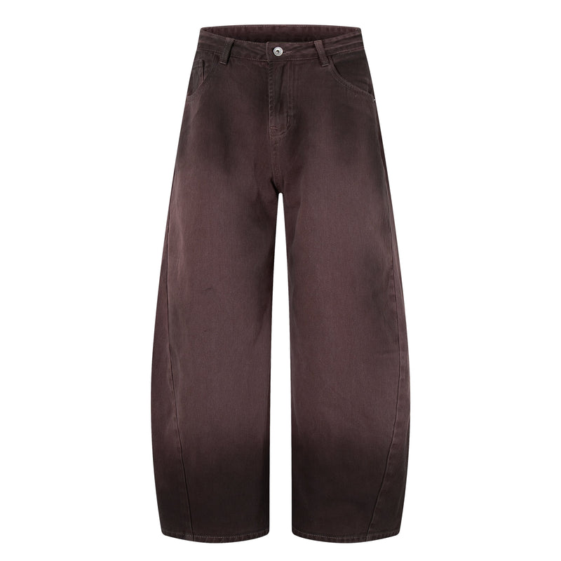 Front view of brown wide-leg jeans with gradient wash and zip fly
