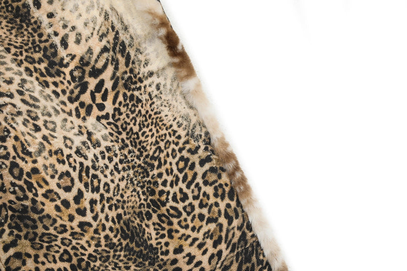 Close-up of fur-trim side seam on leopard print jeans