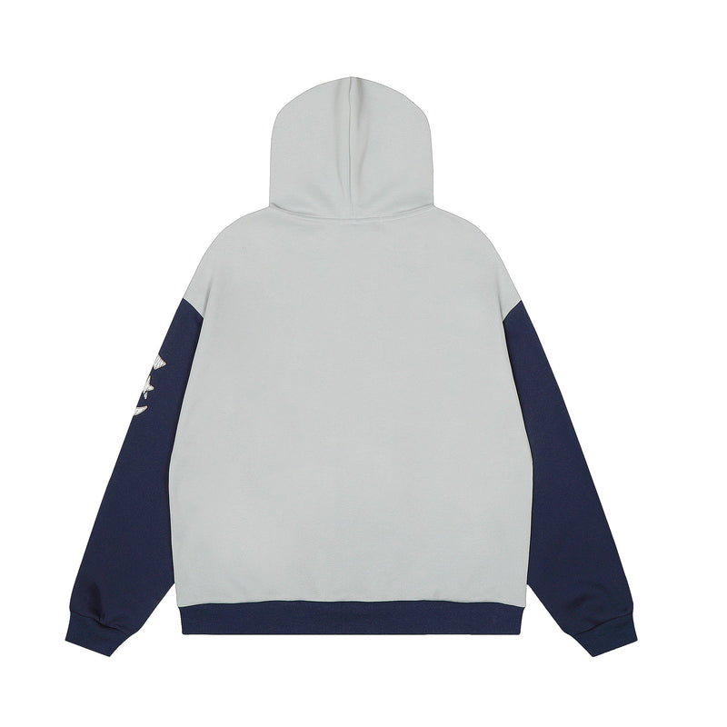 Back view of light gray zip hoodie with navy sleeves and plain hood