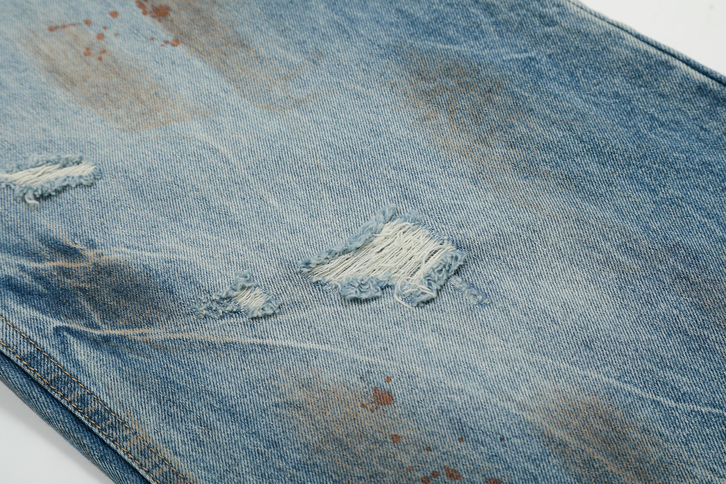 Rust-Wash Distressed Wide-Leg Jeans | Omirad