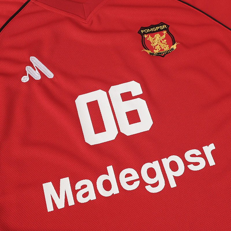 Red streetwear football jersey with white 06 number, Madegpsr logo, and crest detail on chest