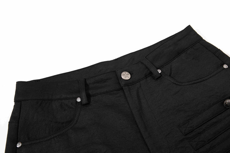 Close-up of black pants waistband with belt loops, button closure, and front pocket details