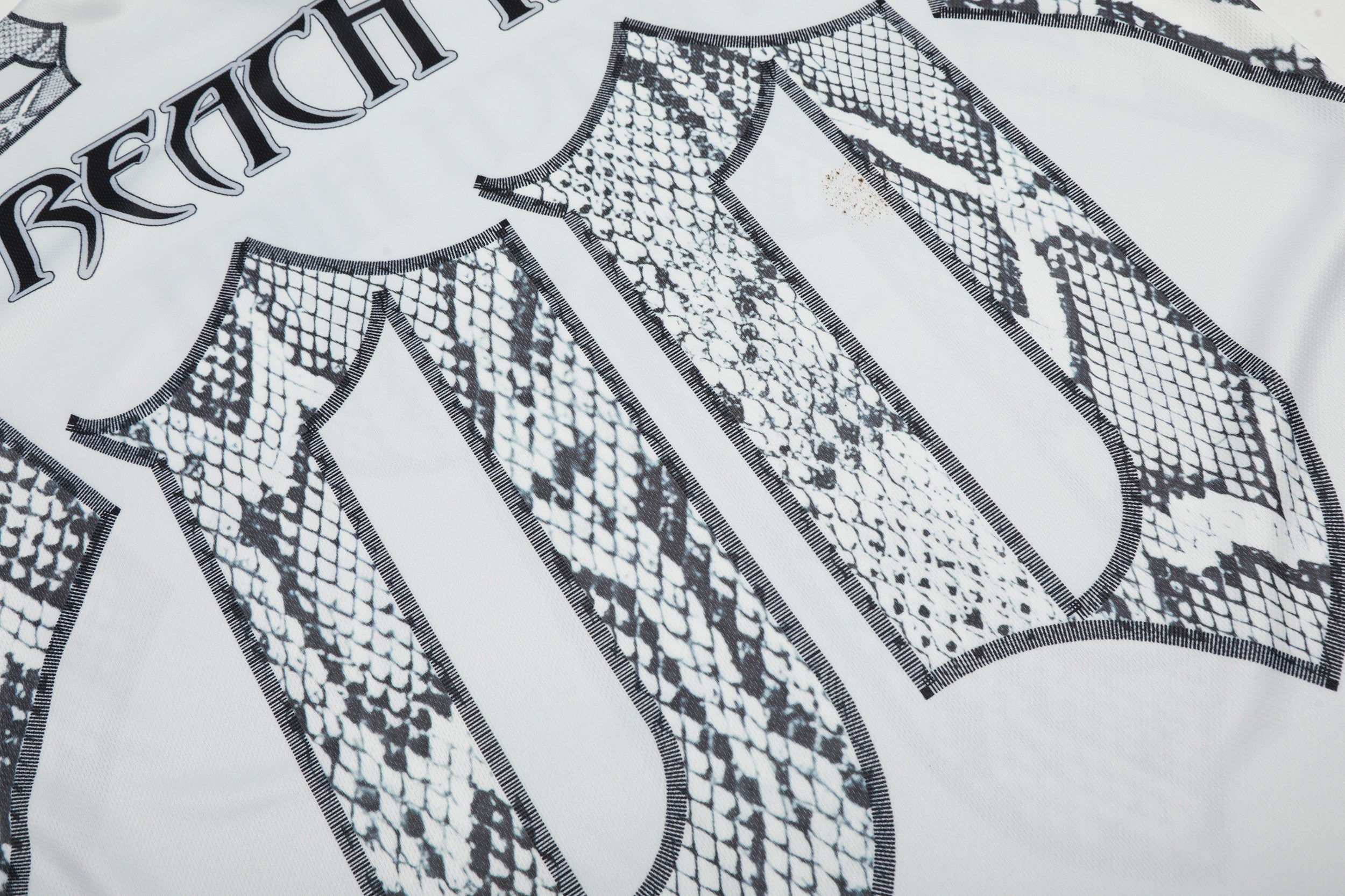 Omirad Reach High Snakeskin Gothic Jersey Tee | Streetwear