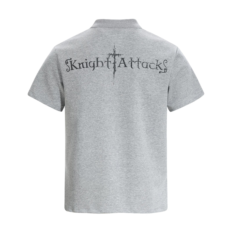 Gray polo tee with back graphic reading Knight Attack and a distressed sword design