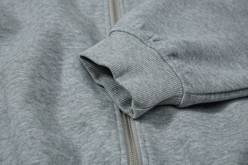 Close-up of gray ribbed cuff on hoodie sleeve