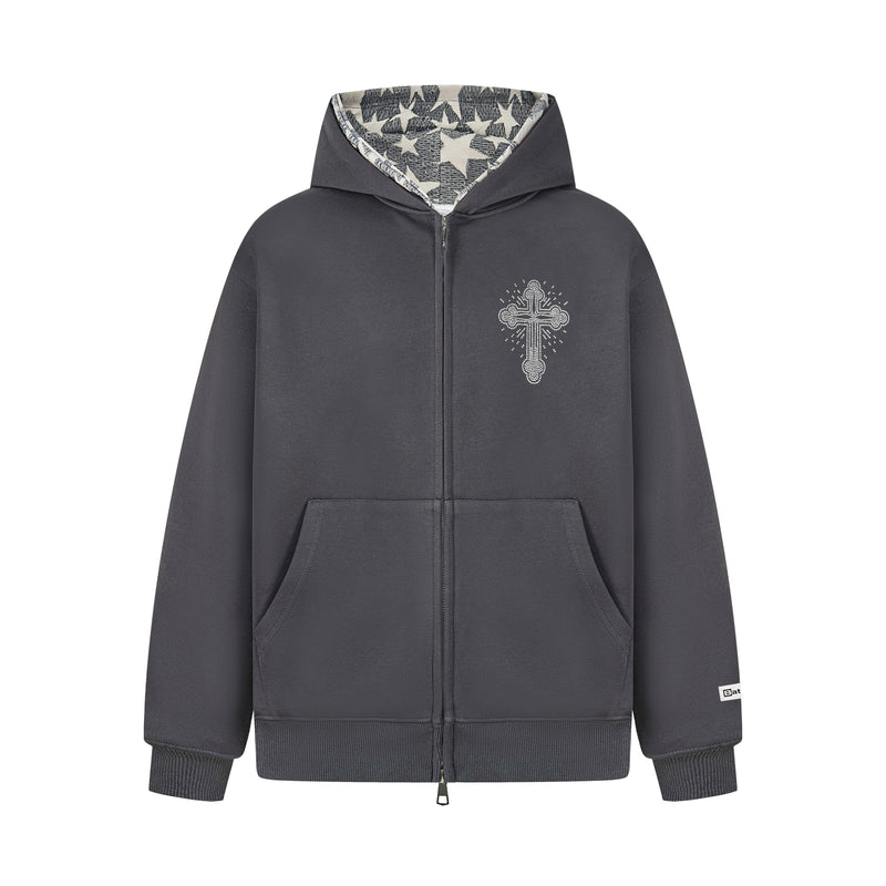 Front view of charcoal gray zip hoodie with white rhinestone cross and star-print hood lining