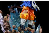 The Seakoff Goku Collectible Figure, a 46cm Dragon Ball Z Kamehameha Statue, intricately displays Goku in orange pants and black shoes on a rocky base with blue spikes. It includes a brown tail, gloves, and small blue spheres around the base to mimic the iconic Kamehameha wave.