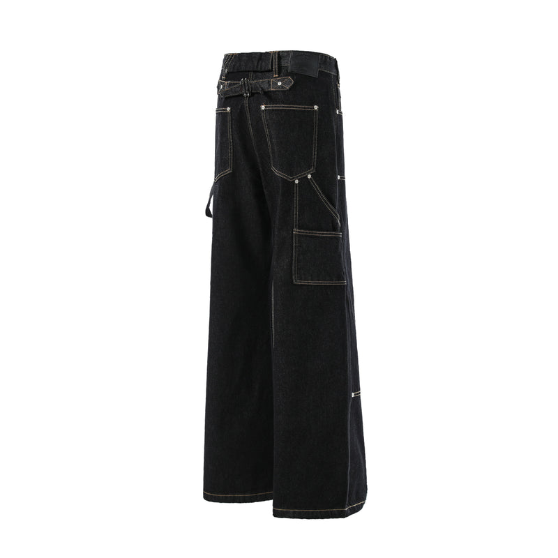Angled back view of black wide-leg cargo jeans showing rear pockets and side strap