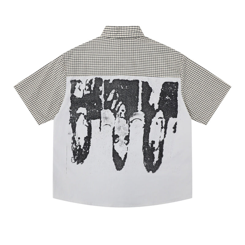 Beige plaid short-sleeve button-up shirt with oversized black graphic print on the back, streetwear style