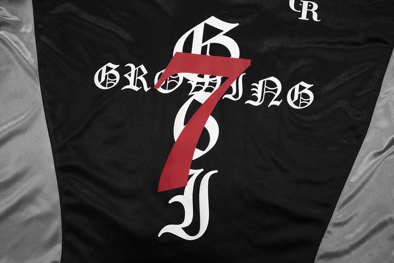 Close-up of jersey front graphic with Gothic 77, red diagonal accent, and gray side panels