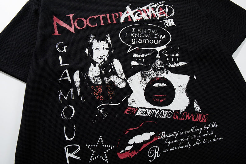 Black cotton graphic tee with punk-style Noctipanic print, distressed typography, and edgy skull and glam artwork