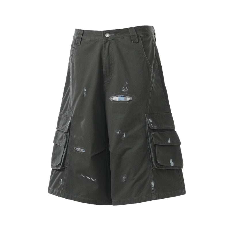 Black cargo shorts angled back view showing side cargo flap pockets and back pockets