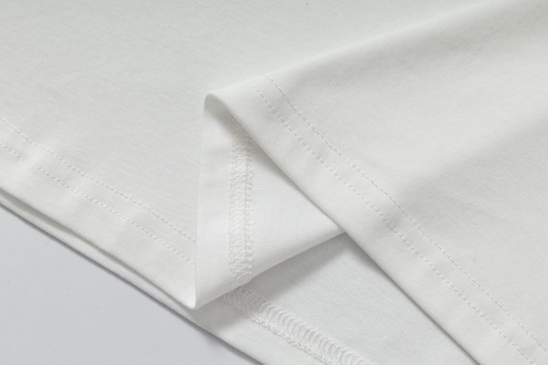 Close-up of white shirt fabric and stitching detail