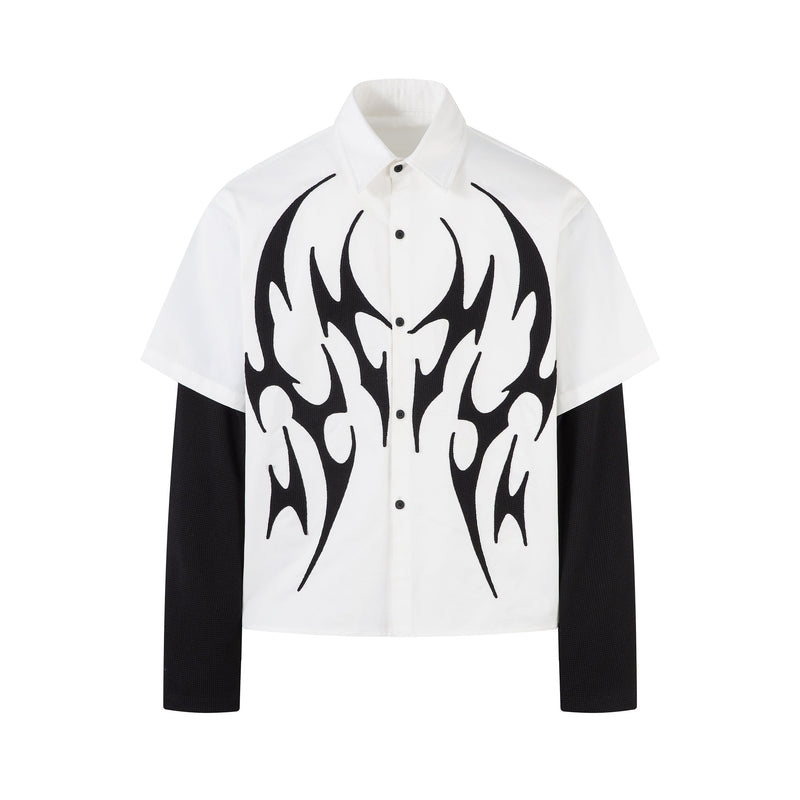 White button-up shirt with black tribal flame graphic and black layered long sleeves, front view