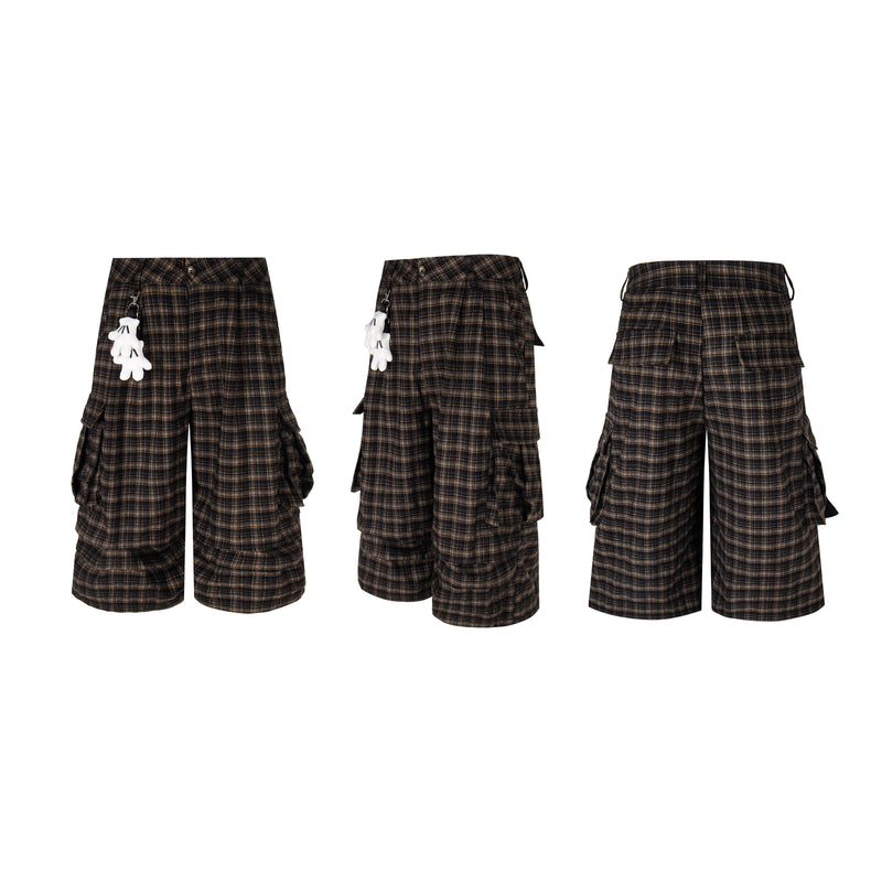 Three views of black and brown plaid knee-length cargo shorts with wide legs