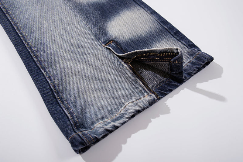 Close-up of hem opening with split side detail and zipper trim