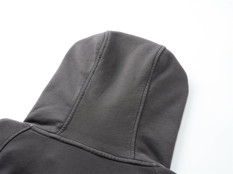 Close-up back view of gray hoodie hood and seam detail