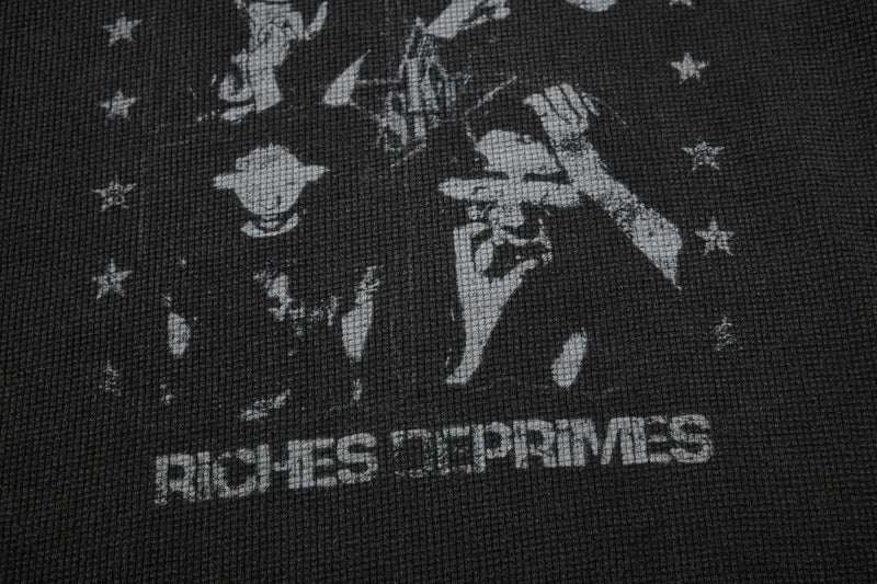 Black waffle knit T-shirt with faded monochrome graphic print and distressed vintage text, Enfants Riches Déprimés style