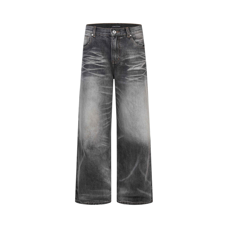 Front view of faded black wide-leg jeans with five pockets and contrast stitching