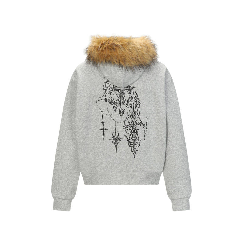 Back view of light gray zip hoodie with tan faux fur hood trim and black ornate gothic graphic