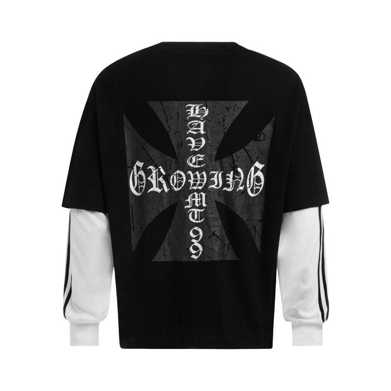 Back view of black layered long sleeve tee with large gothic cross and distressed white lettering