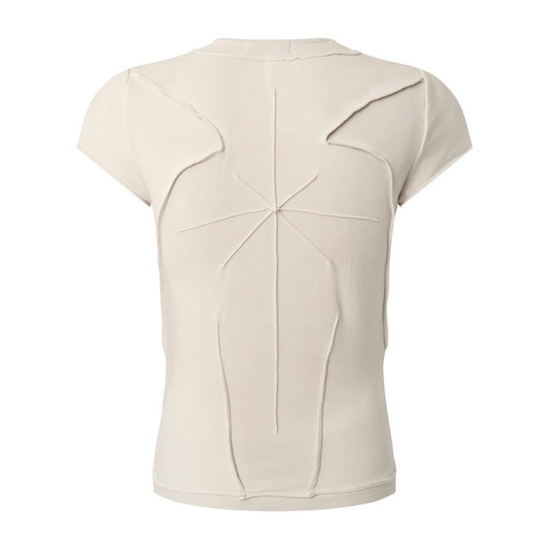 Beige sculpted cotton tee with raw seam paneling and a minimal avant-garde back design
