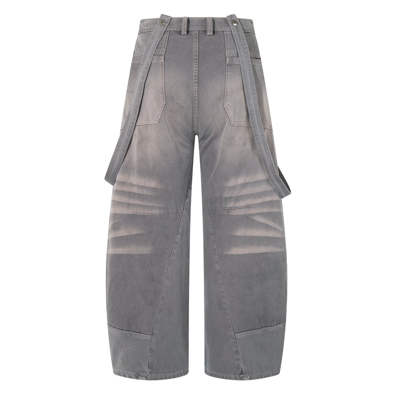 Back view of gray washed wide-leg cargo jeans with strap accents and back pockets