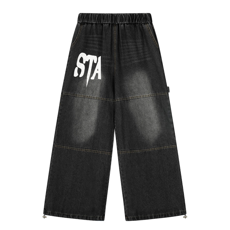 Black washed wide-leg denim pants with elastic waist and large white star graphic on front