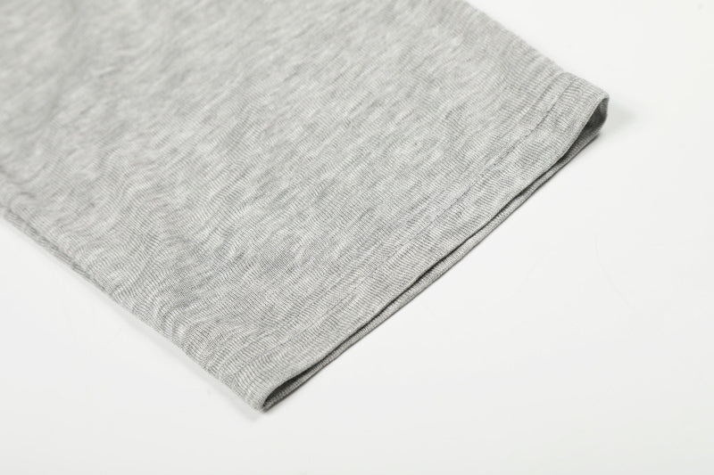 Close-up of gray long sleeve cuff hem