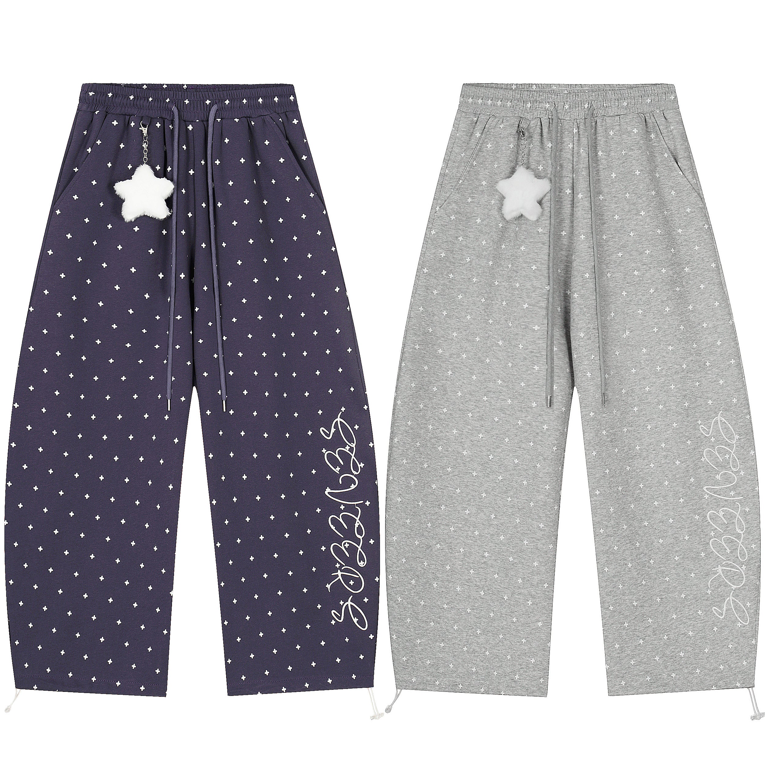 Navy wide-leg sweatpants with all-over micro star print, drawstring waist, plush star charm, and script graphic on lower leg