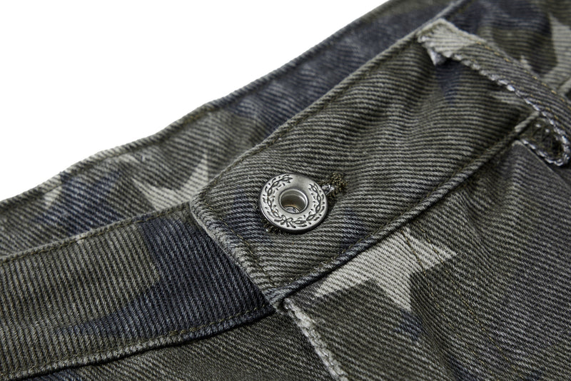 Close-up of jeans waistband button and printed denim texture
