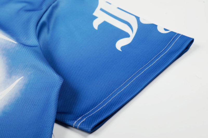 Blue mesh streetwear football jersey with white star graphic and visible stitched hem detail